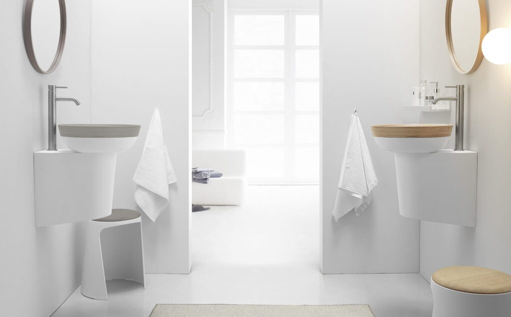 Tecnología y tradición en los nuevos  lavabos de Solid Surface y madera